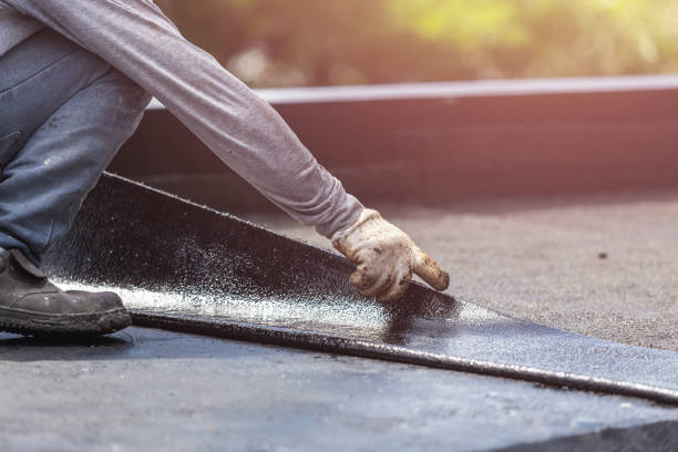 Professional Basement Waterproofing technician working in Little River, SC